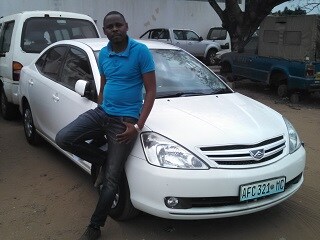 Customer who purchased a car from IDOM Inc.