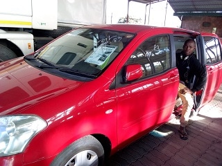 Customer who purchased a car from TRUST CO., LTD .